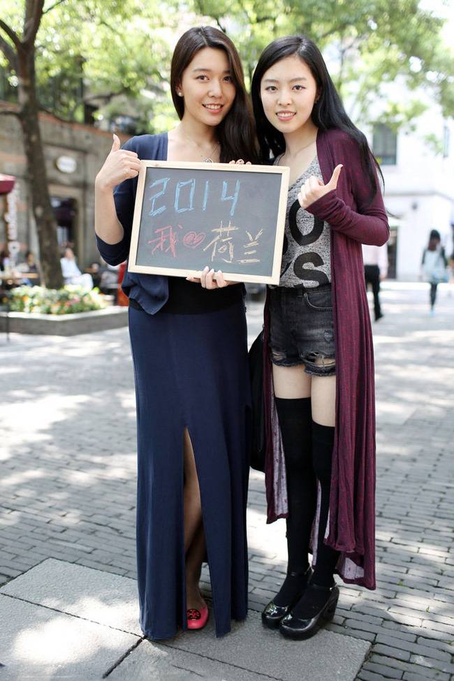 街头美女纷纷寄语世界杯 国足不幸遭遇美女吐槽